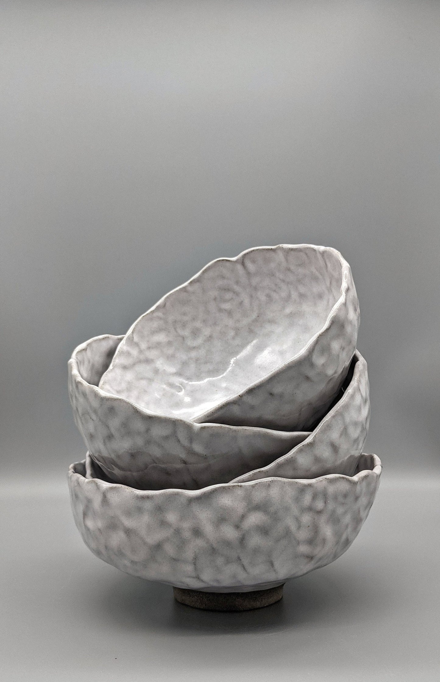 White glaze over concrete clay bowl